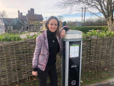 Helen with EV charge point